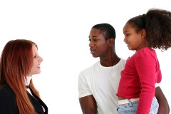 a social worker conversing with clients