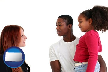 a social worker conversing with clients - with Pennsylvania icon