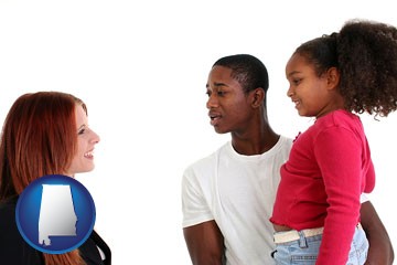 a social worker conversing with clients - with Alabama icon